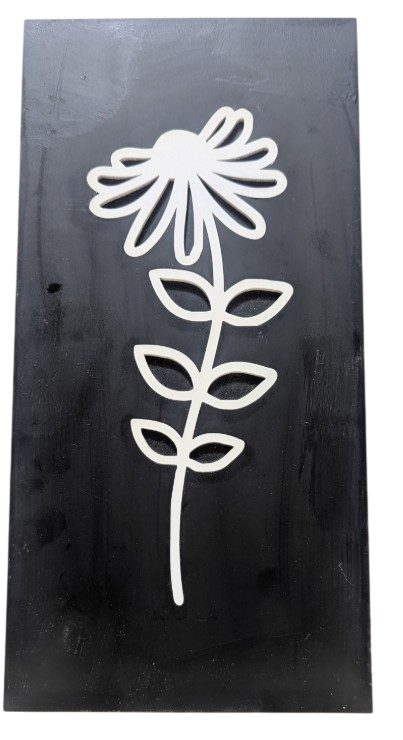 White on black inlayed flower